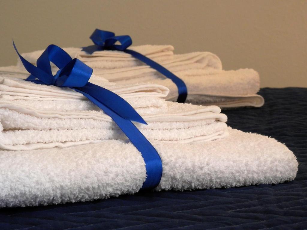 Postel nebo postele na pokoji v ubytování Corsaro B&B