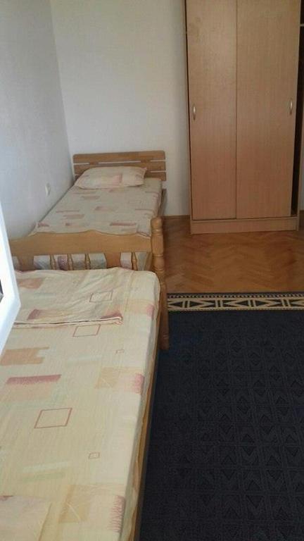 Postel nebo postele na pokoji v ubytování Anika apart