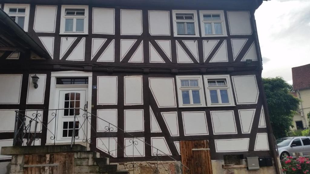 a half timbered house with white and black at Baunaeck in Baunatal