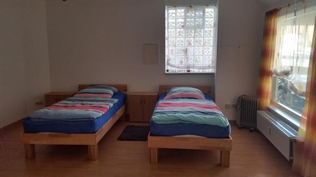 Postel nebo postele na pokoji v ubytování Baunaeck