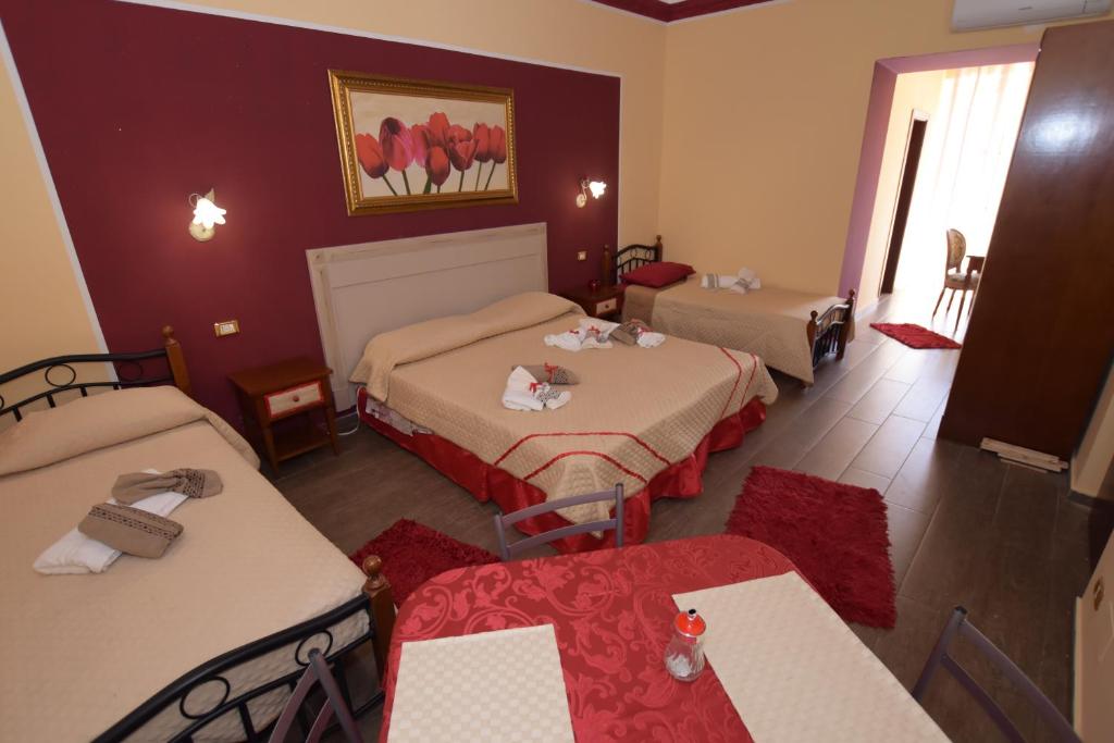 Postel nebo postele na pokoji v ubytování B&B Empedocle
