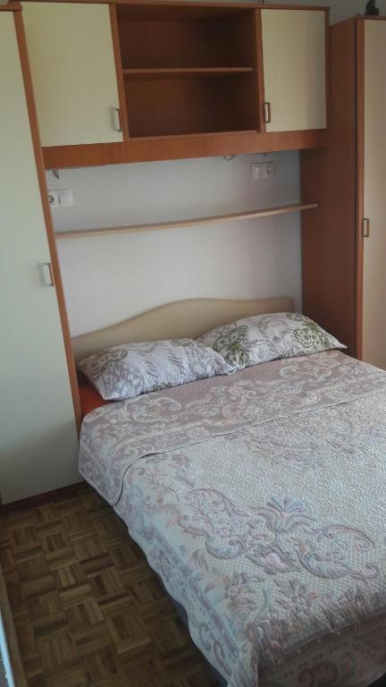 Postel nebo postele na pokoji v ubytování Apartments Brčić