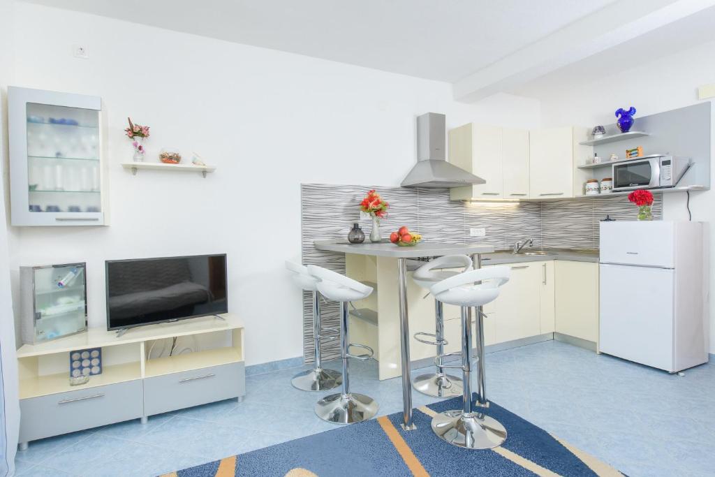 Kuchyň nebo kuchyňský kout v ubytování Apartments Patricia