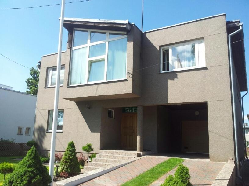 a house with a large window on top of it at Eha Suija Home Accommodation in Tartu