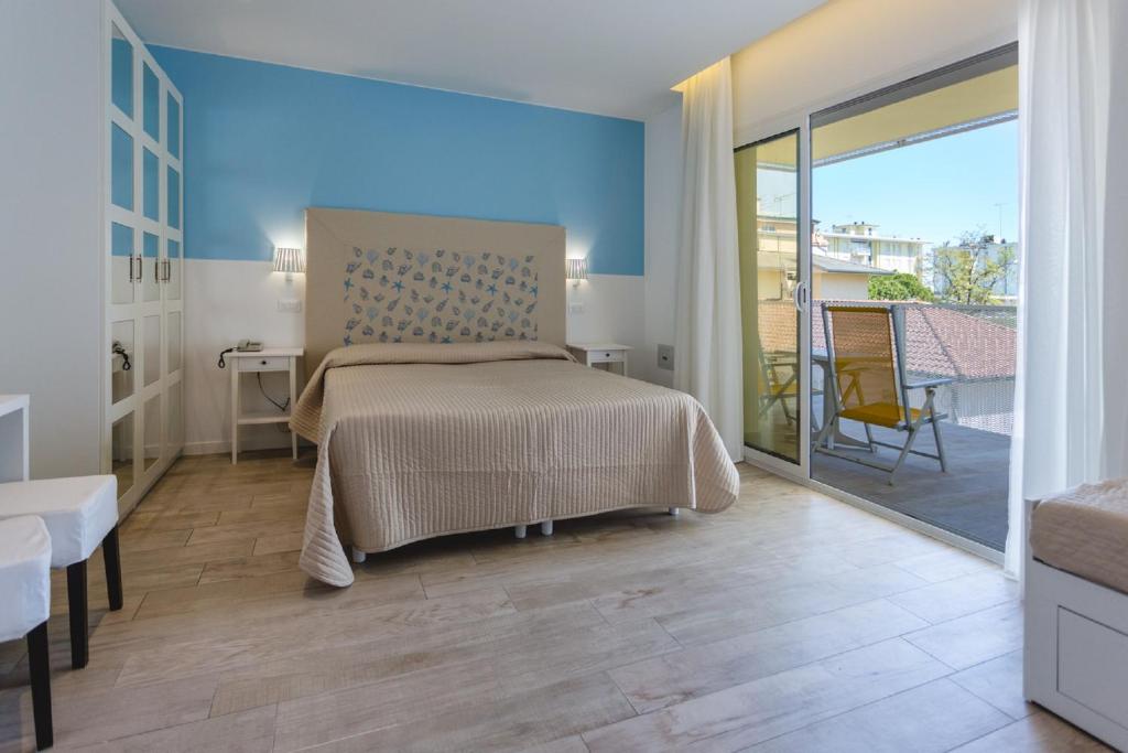 Postel nebo postele na pokoji v ubytování Hotel Speranza