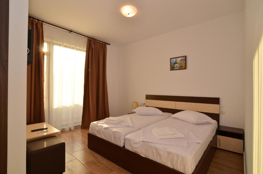 Postel nebo postele na pokoji v ubytování Summer Rest