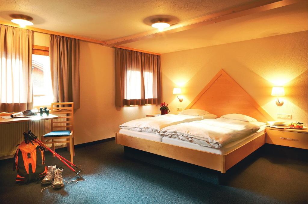 Postel nebo postele na pokoji v ubytování Gasthof Taube