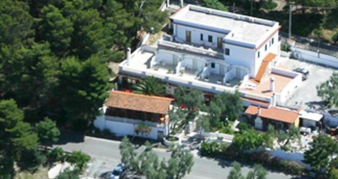 an aerial view of a large white building at La Collinetta in Peschici