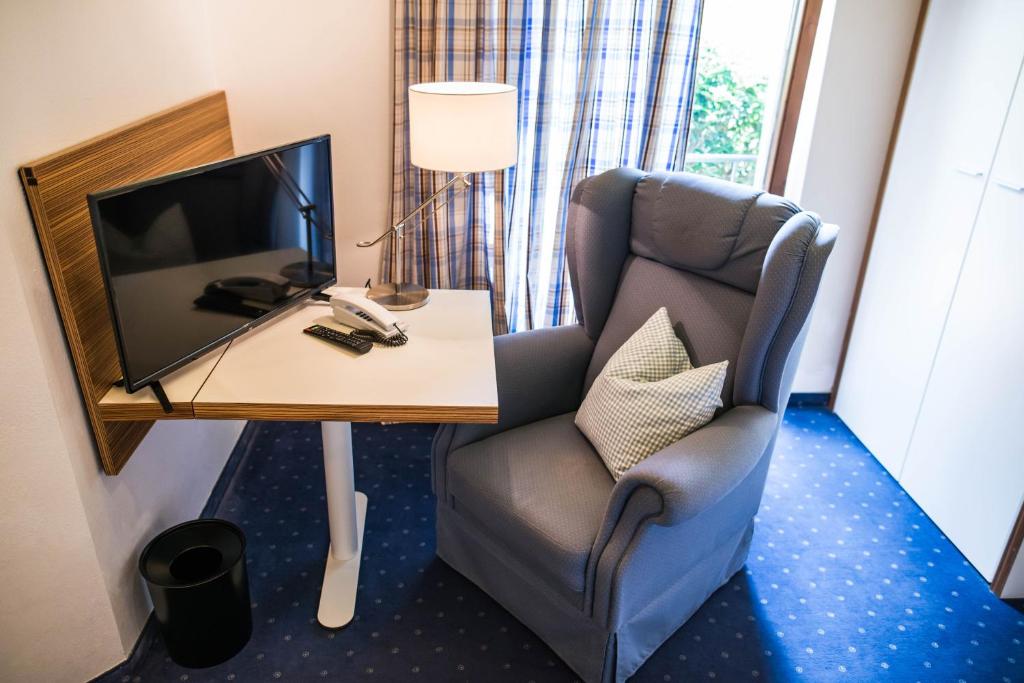 TV a/nebo společenská místnost v ubytování Hotel Domizil