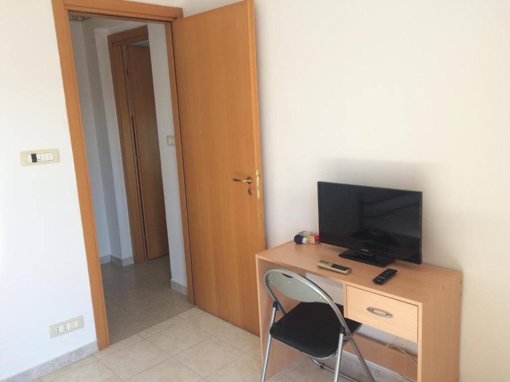 TV a/nebo společenská místnost v ubytování B&B La Terrazza Dell'Itria