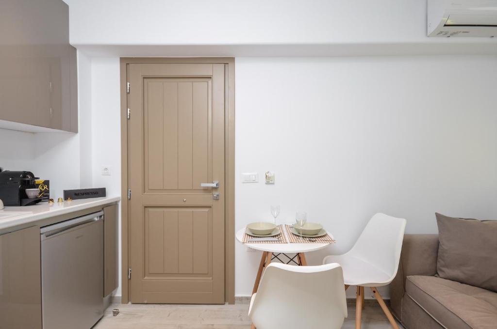 Kuchyň nebo kuchyňský kout v ubytování Elegant Apartments