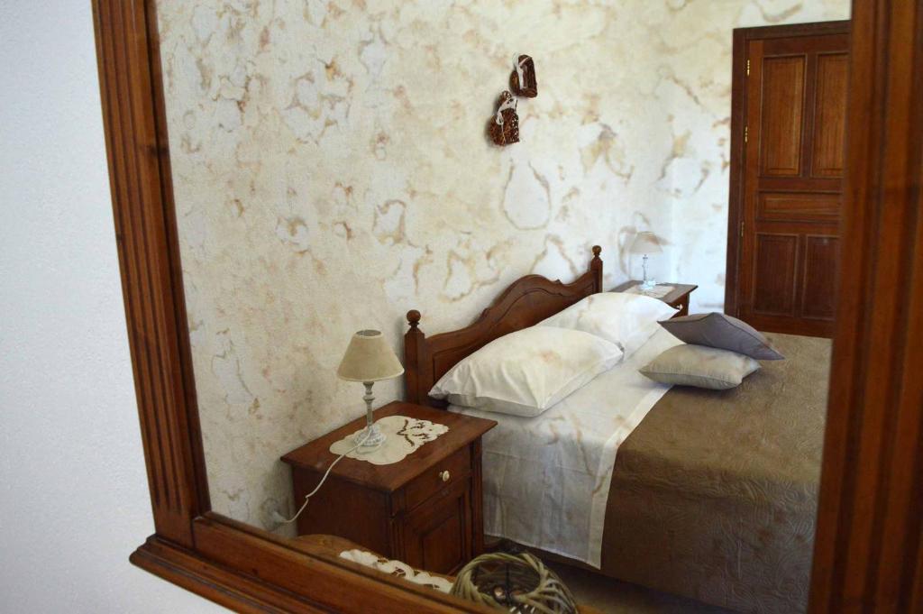 Postel nebo postele na pokoji v ubytování B&B Profumo di Alloro