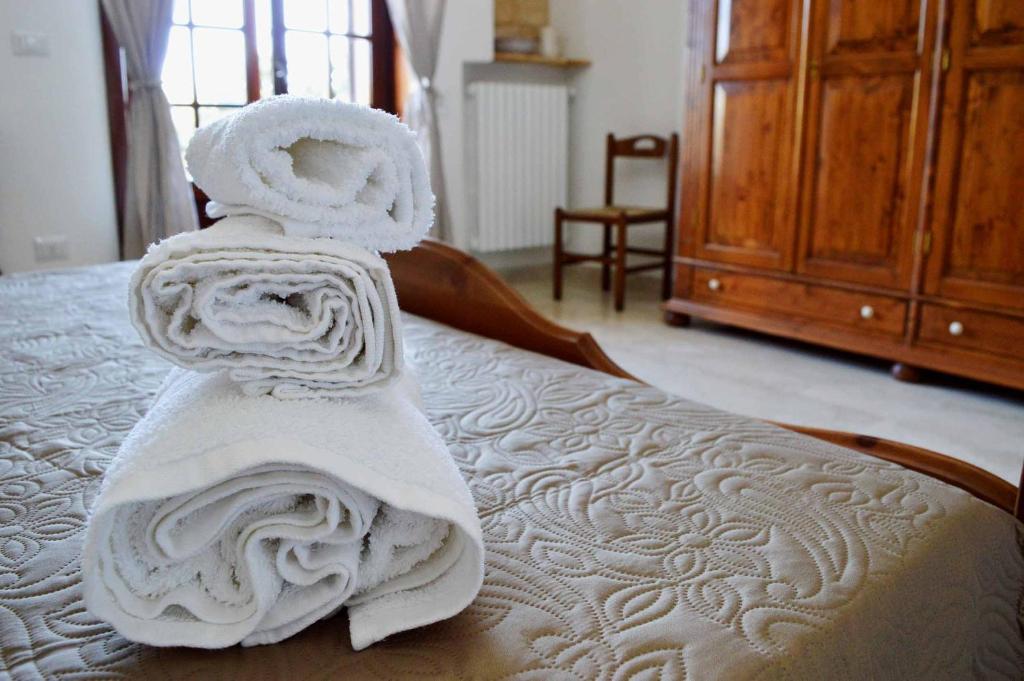 Postel nebo postele na pokoji v ubytování B&B Profumo di Alloro