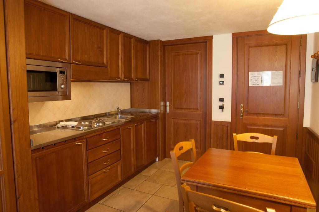 Kuchyň nebo kuchyňský kout v ubytování Residence Le Grand Chalet