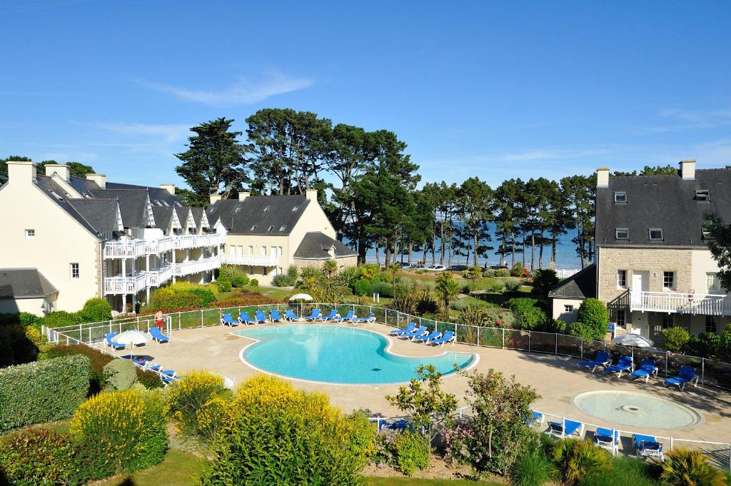 an aerial view of a pool at a resort at Residence Cap Azur - maeva Home in Fouesnant