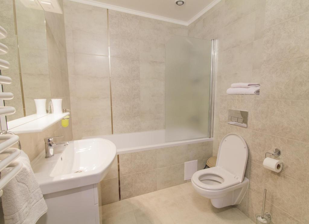 Koupelna v ubytování Zinedine Sport-Hotel