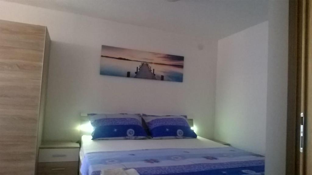 Posteľ alebo postele v izbe v ubytovaní Holiday Home Babič