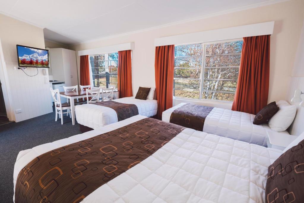 Postel nebo postele na pokoji v ubytování Boulevard Motel