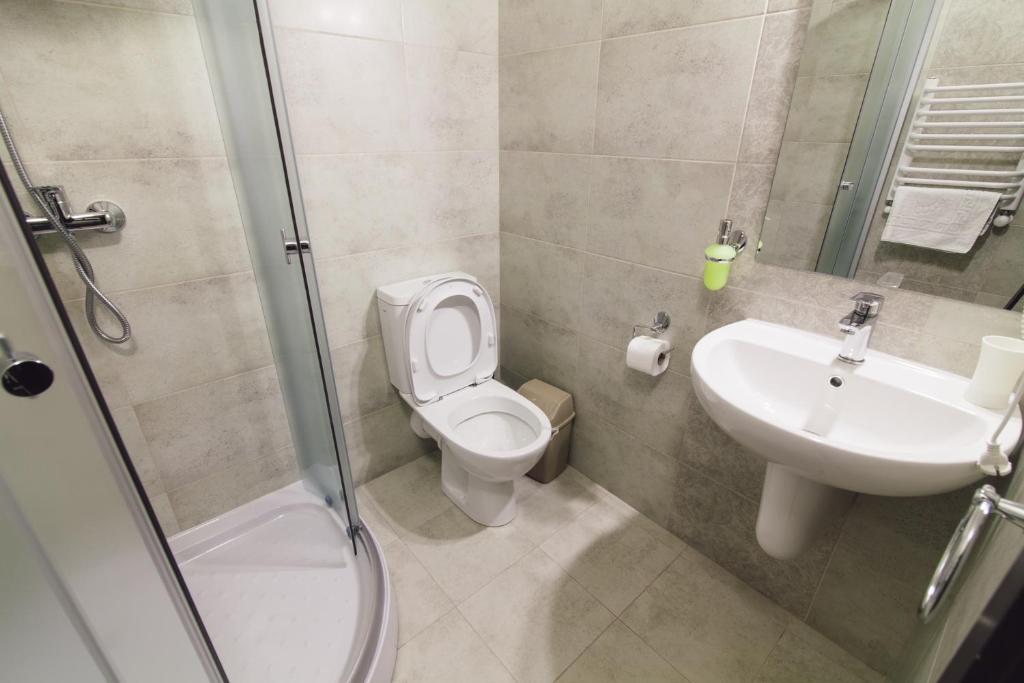 Koupelna v ubytování Zinedine Sport-Hotel