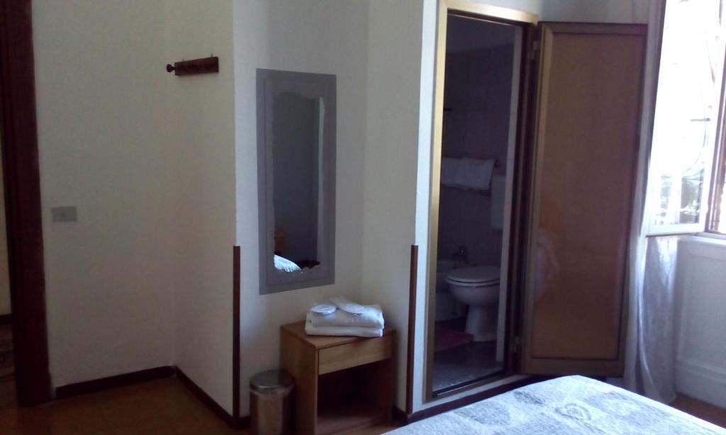 Postel nebo postele na pokoji v ubytování Hotel Tirreno