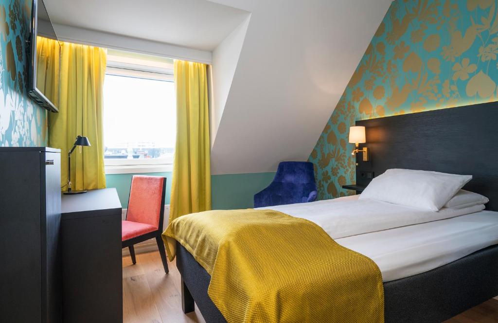 Postel nebo postele na pokoji v ubytování Thon Hotel Nidaros