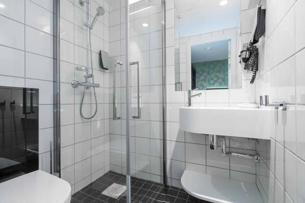 Koupelna v ubytování Thon Hotel Nidaros