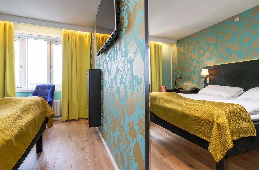 Postel nebo postele na pokoji v ubytování Thon Hotel Nidaros