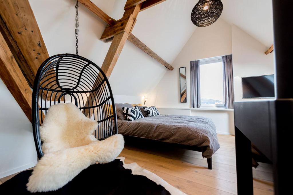 Postel nebo postele na pokoji v ubytování Loods Logement