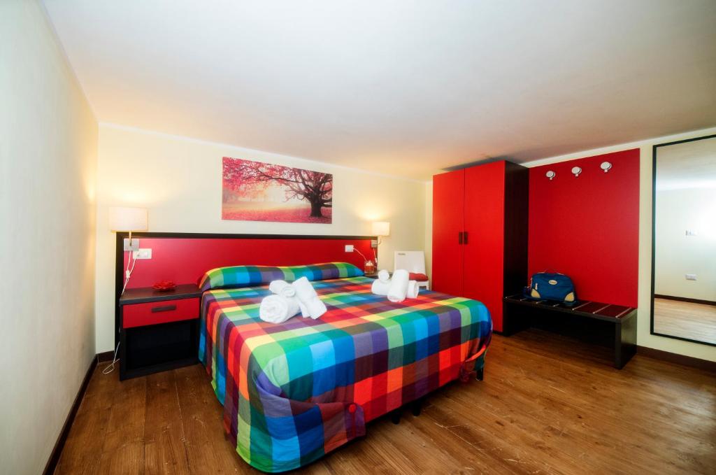 Postel nebo postele na pokoji v ubytování B&B Borgo Marinella