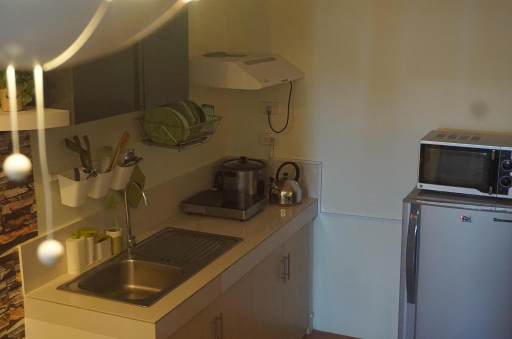 Apartelle D' Oasis - One-Bedroom Apartment