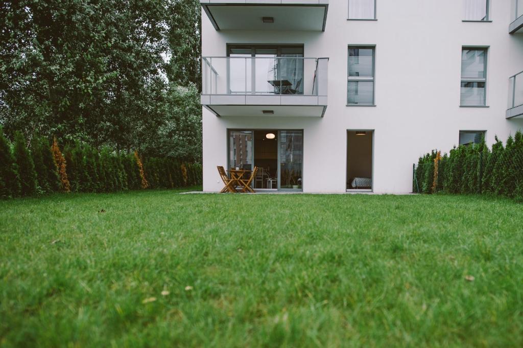 Vonkajšia záhrada v ubytovaní Apartamenty Rodzina nad morzem