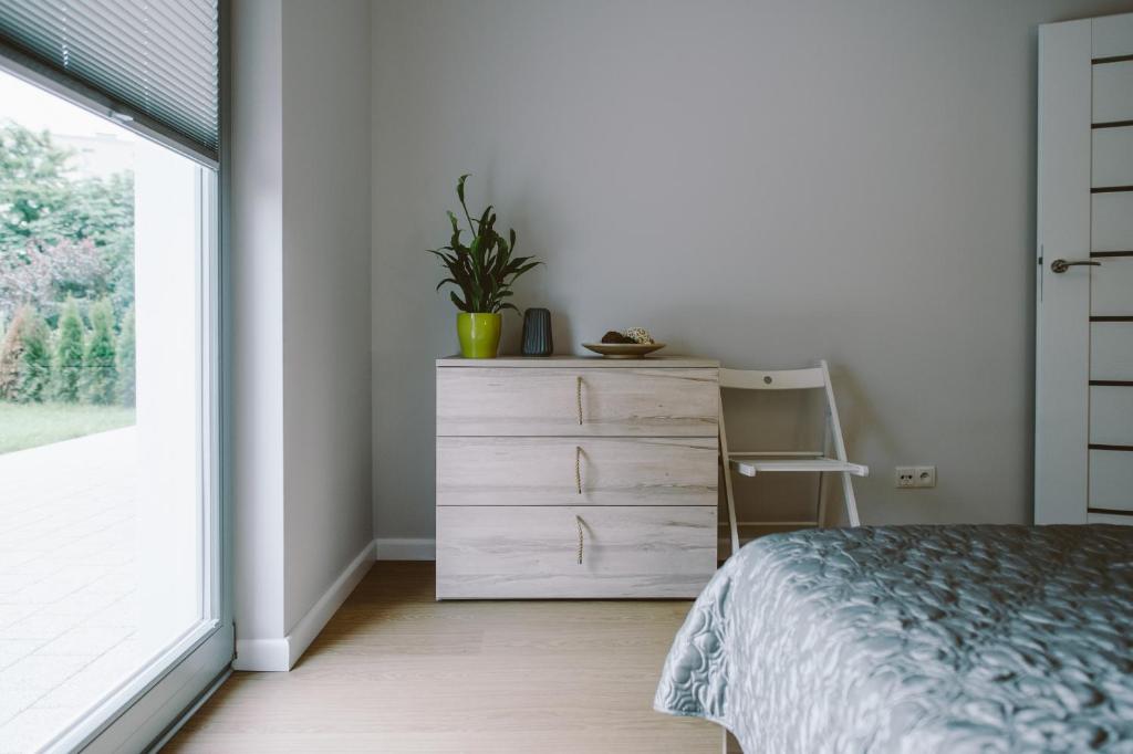Posteľ alebo postele v izbe v ubytovaní Apartamenty Rodzina nad morzem