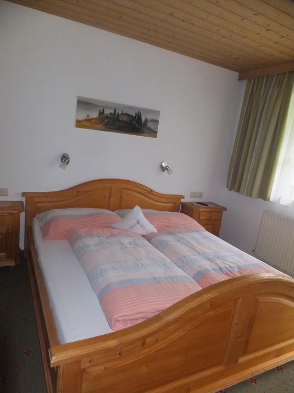 Postel nebo postele na pokoji v ubytování Haus Feldbründl