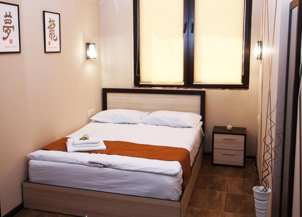 Postel nebo postele na pokoji v ubytování WOW Guest house in apartment 141