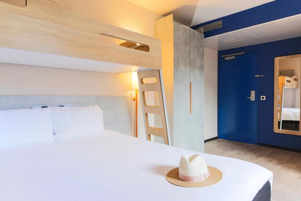 Llit o llits en una habitació de Ibis Budget Albi Centre