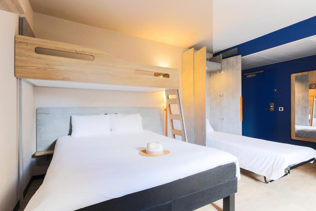 Llit o llits en una habitació de Ibis Budget Albi Centre