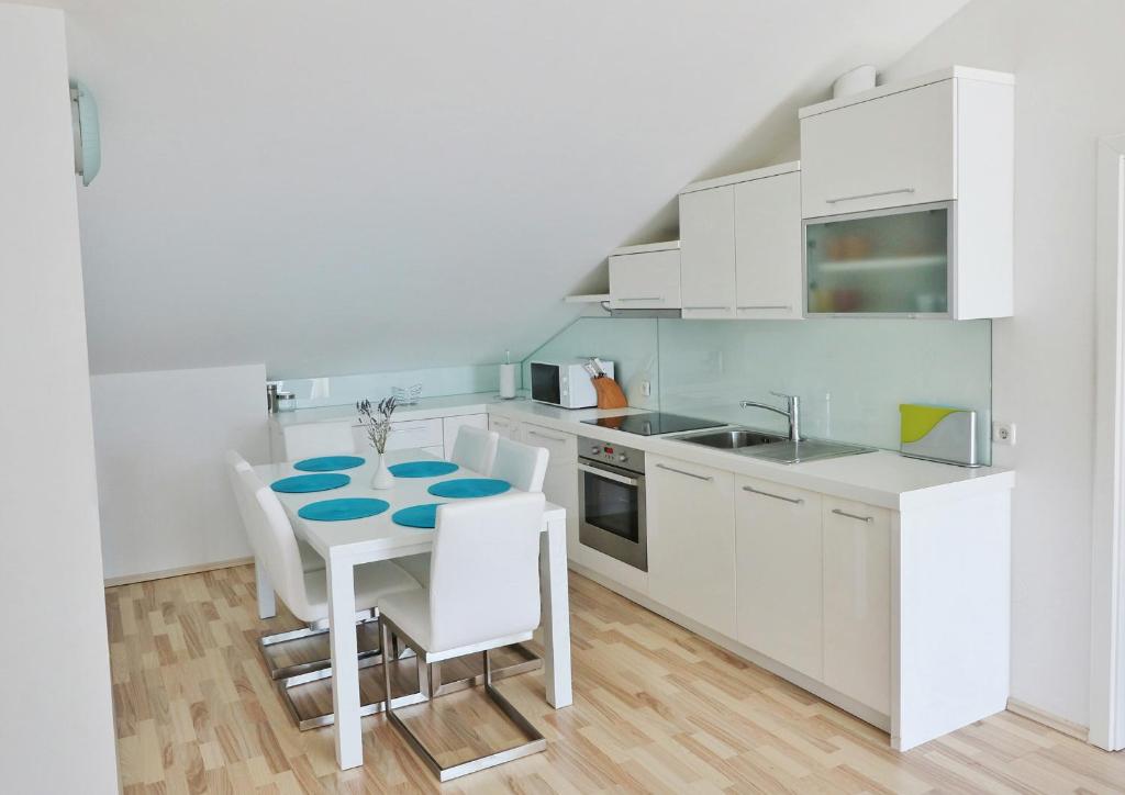Kuchyň nebo kuchyňský kout v ubytování Apartments Barbati