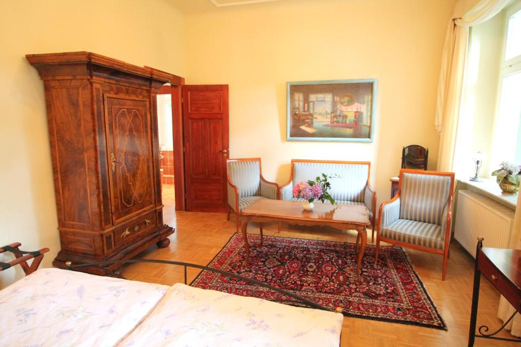 Postel nebo postele na pokoji v ubytování Hotel-Appartement-Villa Ulenburg