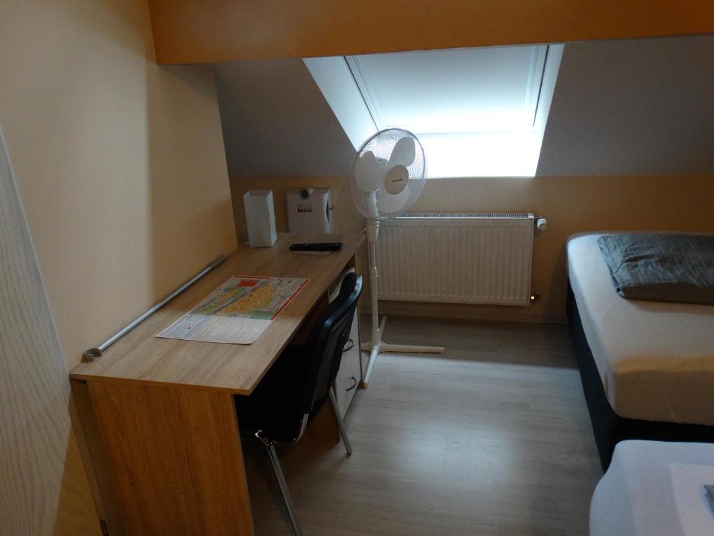 Postel nebo postele na pokoji v ubytování Hotel Amy