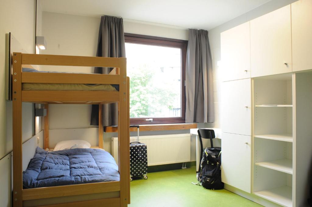 Postel nebo postele na pokoji v ubytování Hostel Bruegel