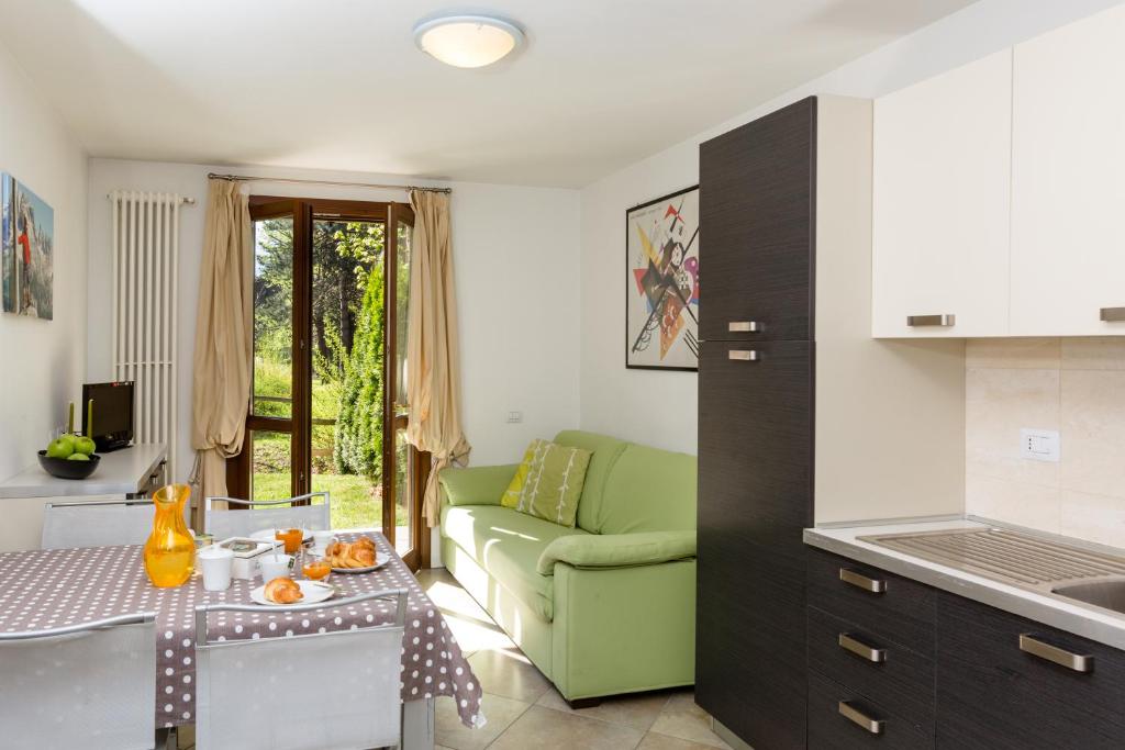 Kuchyň nebo kuchyňský kout v ubytování Residence Rta La Rosa delle Dolomiti