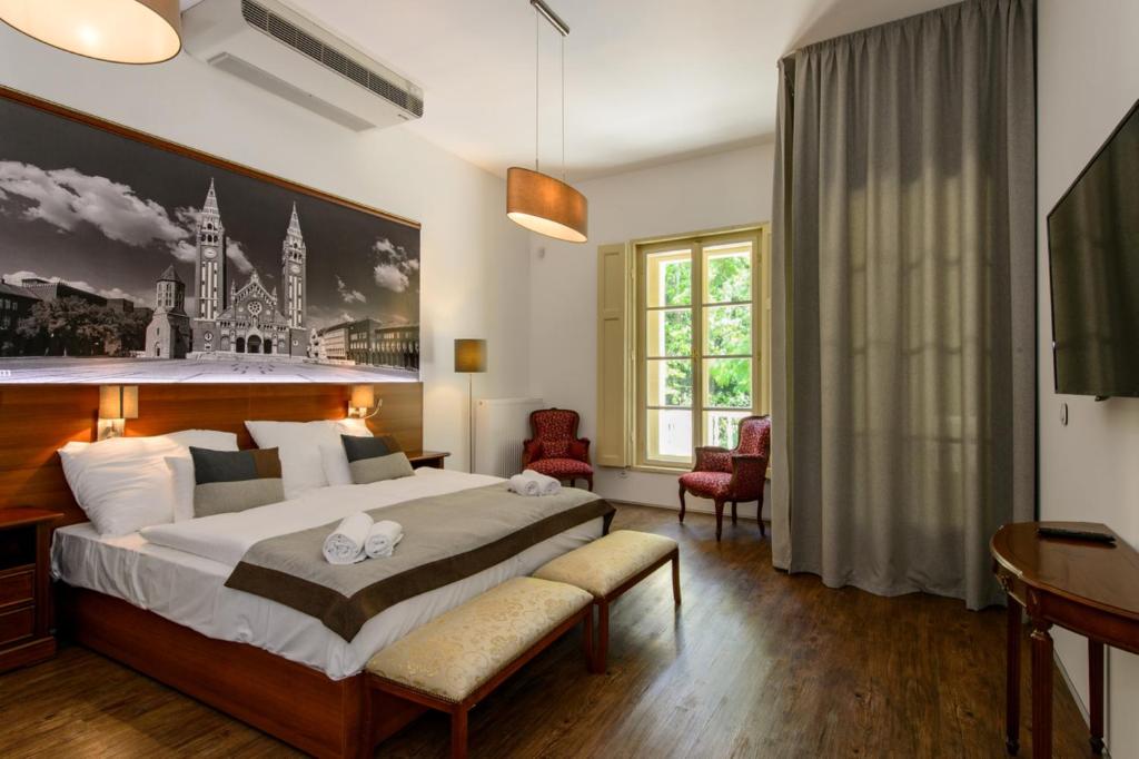 Postel nebo postele na pokoji v ubytování Klebelsberg Kastély Budapest