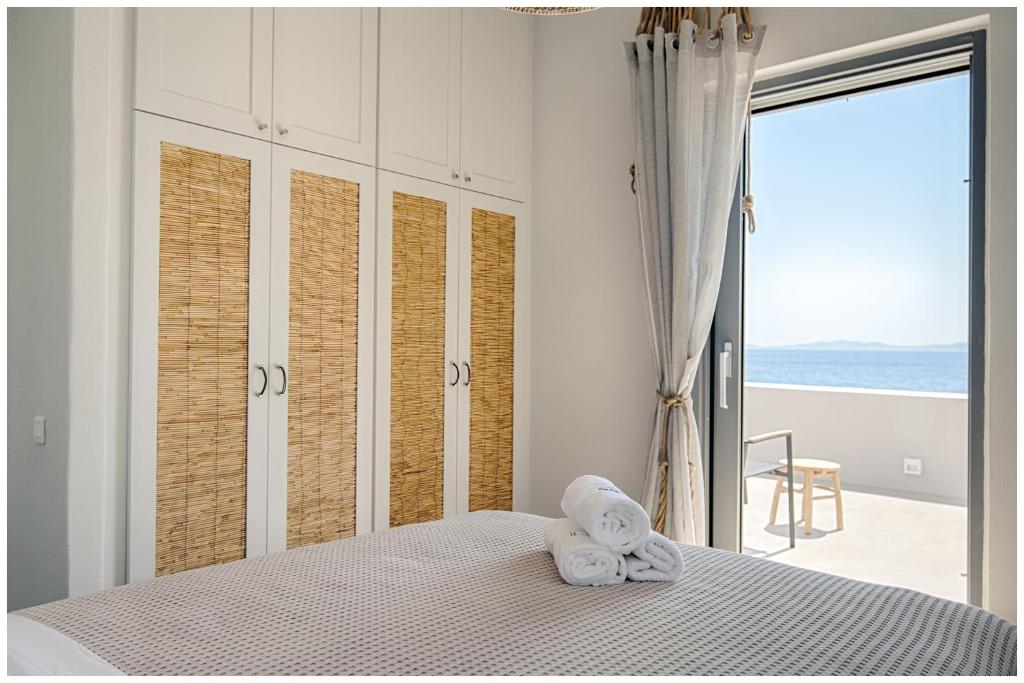A bed or beds in a room at San Romano Villas