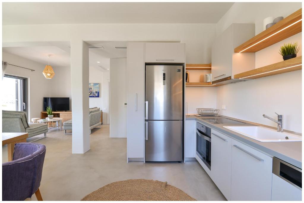 A kitchen or kitchenette at San Romano Villas
