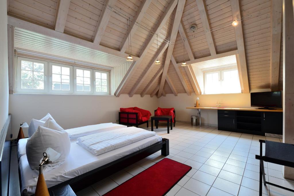 Postel nebo postele na pokoji v ubytování Art Hotel Weimar
