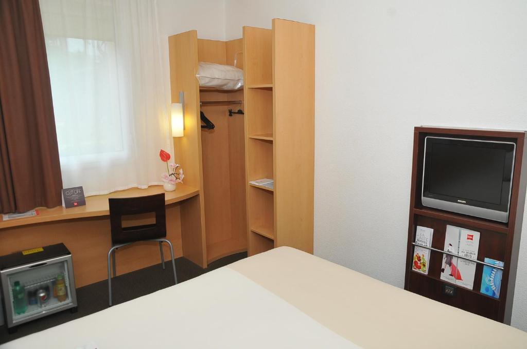 Postel nebo postele na pokoji v ubytování Ibis Cotonou