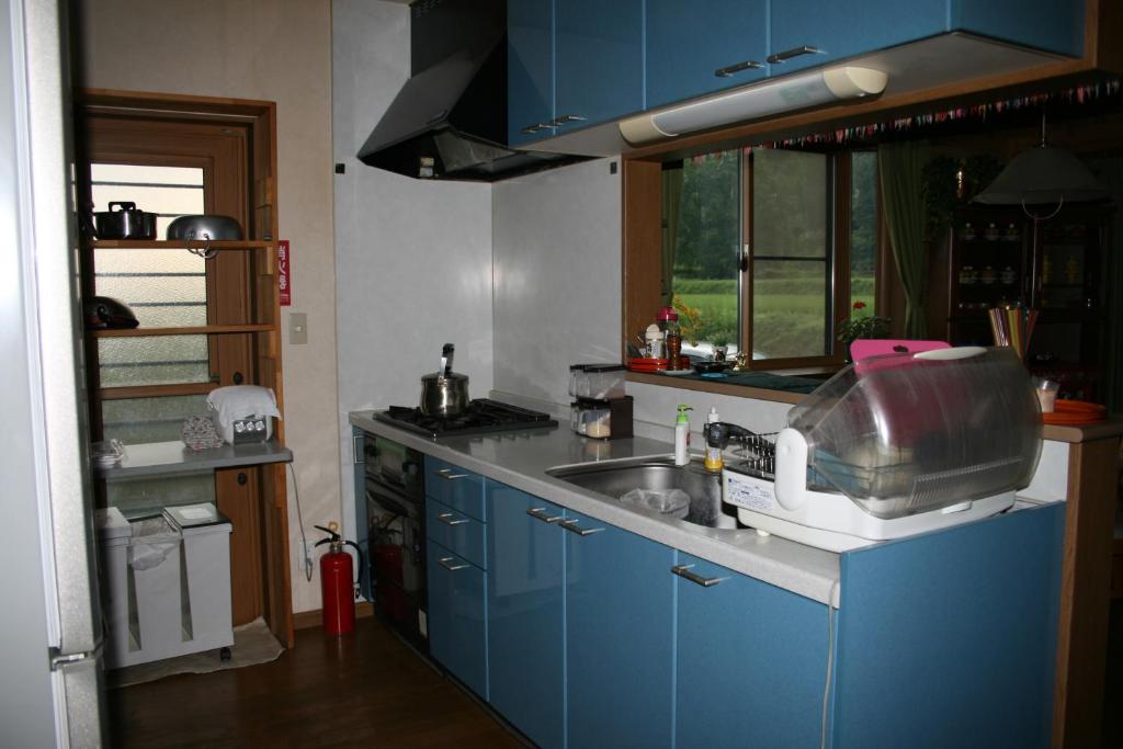 Kuchyň nebo kuchyňský kout v ubytování Azumino Backpackers 山の風