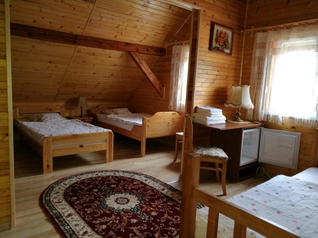Gościniec Grek Zorba - pokoje i domki 4 osobowe - 16km od Zator Energylandia - Habitación Familiar