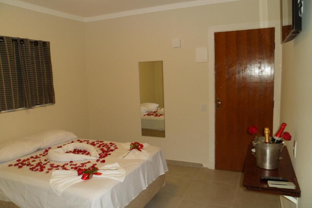 Postel nebo postele na pokoji v ubytování Hotel Pousada Rio Mar
