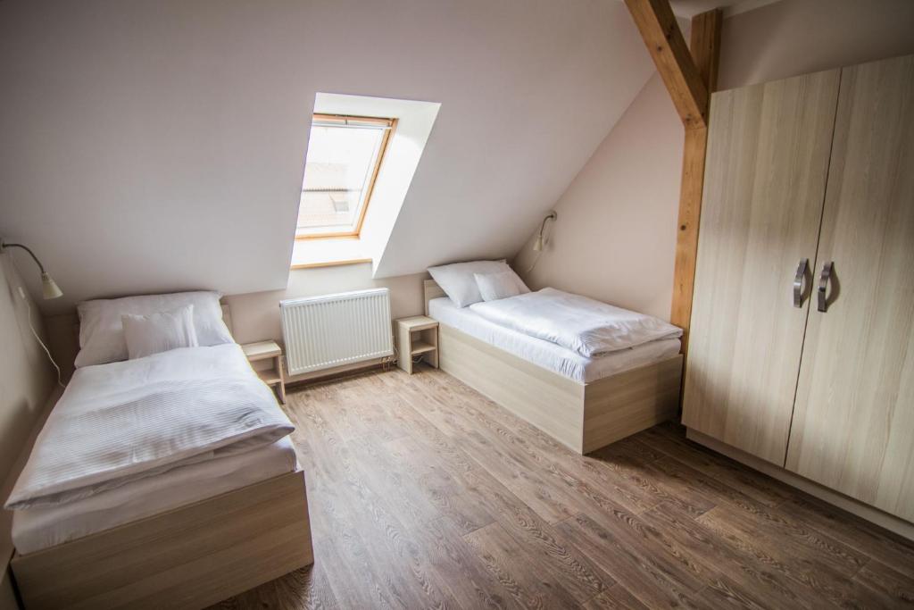 Postel nebo postele na pokoji v ubytování Pension Viktorin